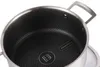 A close-up view of the interior of a stainless steel pot with a honeycomb non-stick coating. Podgląd zdjęcia produktu