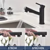 A kitchen faucet with water running, and close-ups of a hand holding the faucet head demonstrating different spray modes. Produktbild-Vorschau