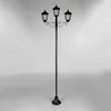 A black, three-headed lamppost stands against a plain gray background. Produktbild-Vorschau