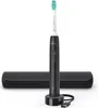 A black electric toothbrush with a charging base and travel case, set against a white background. Produktbild-Vorschau