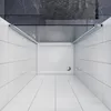 A top-down view of a modern shower enclosure with white tiled walls and floor, and a white shower tray. Podgląd zdjęcia produktu