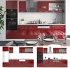 A modern, high-gloss red kitchen unit with integrated appliances, set against a white tiled wall. Anteprima dell’immagine prodotto