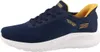 A single navy blue Skechers sneaker with yellow accents is shown from the side against a white background. Voir les images du produit