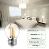 A bedroom scene with a bed, curtains, and bedside tables, with a light bulb in the foreground and product specifications overlaid. Produktbild-Vorschau