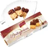 A box of Coppenrath Spritzgenuss Zartbitter Schoko cookies with some cookies displayed on a white leaf-shaped plate. Produktbild-Vorschau