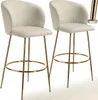 Two bar stools with gold legs on a white background. Produktbild-Vorschau