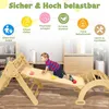 A child plays on a wooden climbing structure indoors, with marketing text and icons at the top. Produktbild-Vorschau