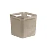 A beige storage basket with holes. Anteprima dell’immagine prodotto