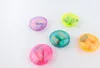 Five colorful cases of earplugs are arranged on a white background. Produktbild-Vorschau