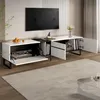 A modern TV stand with multiple compartments, some open and some with doors, in a living room setting. Anteprima dell’immagine prodotto