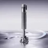 A sleek, metallic vacuum cleaner is presented against a gradient background with abstract, flowing lines. Produktbild-Vorschau