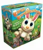 The image shows the colorful packaging of a board game called "Karlo Karottenschreck". The box features cartoonish rabbits and carrots, suggesting a fun game for children. A small inset shows children playing the game. Produktbild-Vorschau