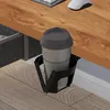 A close-up view of a cup holder attached to the side of a wooden desk, holding a travel mug. Voir les images du produit