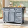 A kitchen island with storage and a wooden countertop is shown in a kitchen setting. Voir les images du produit