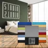 A bedroom scene with a bed and a stack of colorful bedsheets, along with feature icons. Produktbild-Vorschau