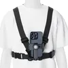 A mannequin wearing a white t-shirt and a black chest harness with a smartphone attached. Náhľad obrázku produktu