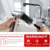 A hand is rinsing a metal cleaning brush under a faucet. Produktbild-Vorschau