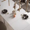 A dining table set for a meal with decorative elements. Náhled obrázku produktu