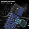 A close-up of a blue and black phone case with a ring holder, attached to a car air vent mount. Produktbild-Vorschau