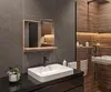 A modern bathroom vanity area with a sink, mirror, and shower. Produktbild-Vorschau