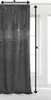 A gray velvet curtain with glitter accents is shown hanging in front of a window. Podgląd zdjęcia produktu
