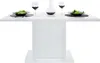 A white dining table set with two plates of salad, two wine glasses, and a decanter. Produktbild-Vorschau