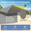 A grey pop-up pavilion on a beach with palm trees and the ocean in the background. Náhľad obrázku produktu