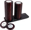 A set of restaurant pagers and their charging base. Voir les images du produit