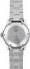 The back of a silver watch with a metal band is shown against a white background. Voir les images du produit