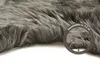 Seitliche Ansicht eines großen Schaffells, ca. 5,2 cm Florhöhe, schwarz

 Produktbild-Vorschau