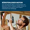 A man is using a cordless drill to screw into a wooden beam, with clamps holding the beam in place. Náhled obrázku produktu