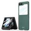 Two green flip phone cases are displayed against a white background. One case is closed and standing upright, while the other is open and angled. Produktbild-Vorschau