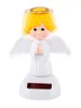 A solar-powered wackelfigur (wobbler figure) in the shape of an angel. Produktbild-Vorschau