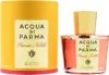 A perfume bottle and its cylindrical packaging are displayed side-by-side against a white background. Anteprima dell’immagine prodotto