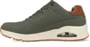 Side view of a green sneaker with a cream sole and brown accents. Voir les images du produit