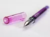 A purple gel pen with its cap off, resting on a white surface. Produktbild-Vorschau