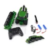 A collection of remote-controlled toy farming equipment, including a harvester, a separate header attachment, a remote control, batteries, and a charging cable, laid out on a white background. Náhled obrázku produktu
