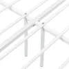 A close-up view of the white metal frame of a bed, showing the support structure and joints. Podgląd zdjęcia produktu