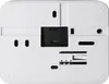 The back of a white electronic device, likely a thermostat, is shown against a white background. Náhled obrázku produktu