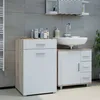 A bathroom vanity with a sink and cabinets. Produktbild-Vorschau