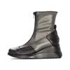A single boot is shown against a white background. Náhled obrázku produktu