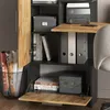 A close-up view of a shelf in a home office setup, featuring various storage items like books, binders, and boxes, along with a small desk area. Anteprima dell’immagine prodotto