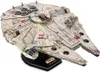 A 3D puzzle model of the Millennium Falcon spaceship from Star Wars, displayed on a black stand. Anteprima dell’immagine prodotto