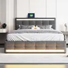 A modern bedroom with a gray upholstered bed frame featuring LED lighting. Produktbild-Vorschau