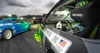 Two cars drifting on a race track. Produktbild-Vorschau