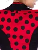 Close-up of the back of a red and black polka dot jacket. Produktbild-Vorschau