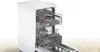 A white dishwasher with its door and racks pulled out, showcasing its interior. Produktbild-Vorschau