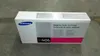 A Samsung toner cartridge box is shown on a gray surface. Produktbild-Vorschau