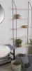 A wall-mounted shelving unit with decorative items, a bench, and baskets. Anteprima dell’immagine prodotto