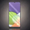 A smartphone with a colorful abstract wallpaper displayed on its screen, set against a dark, textured background. Produktbild-Vorschau